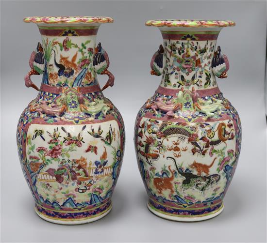 A pair of Chinese 19th century famille rose vases height 33cm